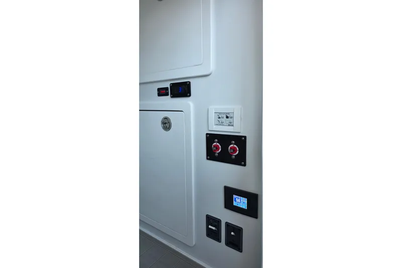 Wanderlust Yacht Photos Pics 2024 Costa Custom Boats 34 SV control panel with switches and digital display.