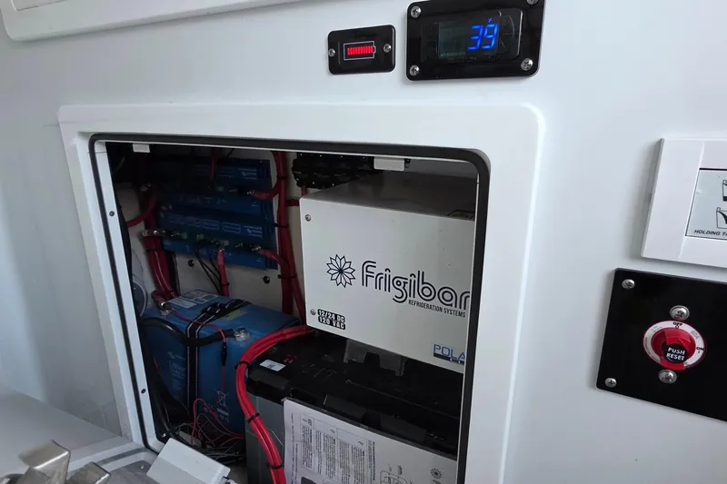 Wanderlust Yacht Photos Pics Electrical system of 2024 Costa Custom Boats 34 SV with Frigibar refrigeration unit.