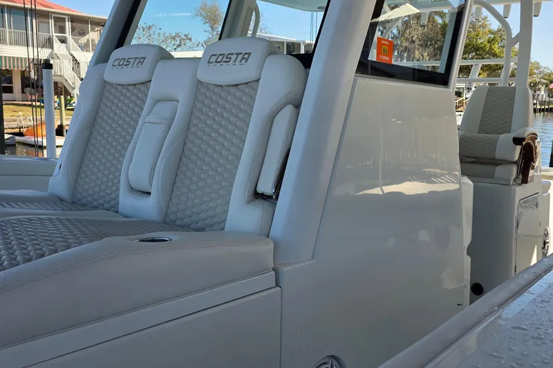 Wanderlust Yacht Photos Pics 2024 Costa Custom Boats 34 SV interior with luxurious seating and modern design.