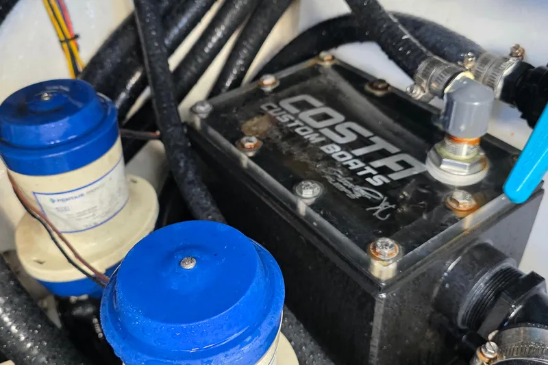 Wanderlust Yacht Photos Pics 2024 Costa Custom Boats 34 SV engine compartment with wiring and components.