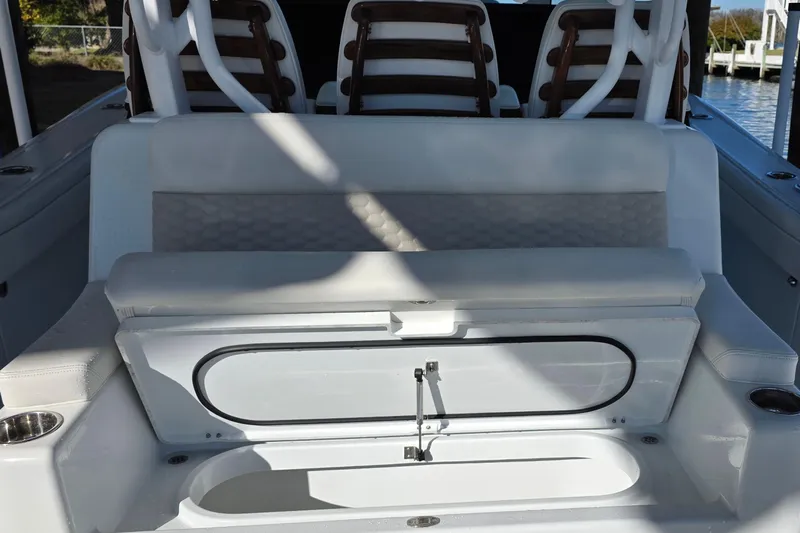 Wanderlust Yacht Photos Pics 2024 Costa Custom Boats 34 SV interior seating and storage area.