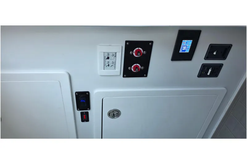 Wanderlust Yacht Photos Pics Control panel of 2024 Costa Custom Boats 34 SV, featuring switches and digital display.