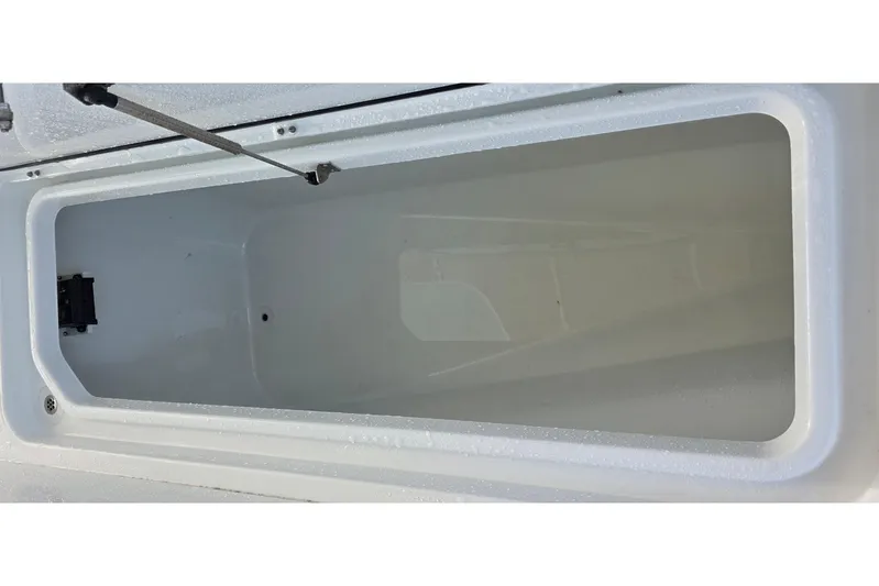 Wanderlust Yacht Photos Pics 2024 Costa Custom Boats 34 SV storage compartment, open and empty, showcasing interior space.