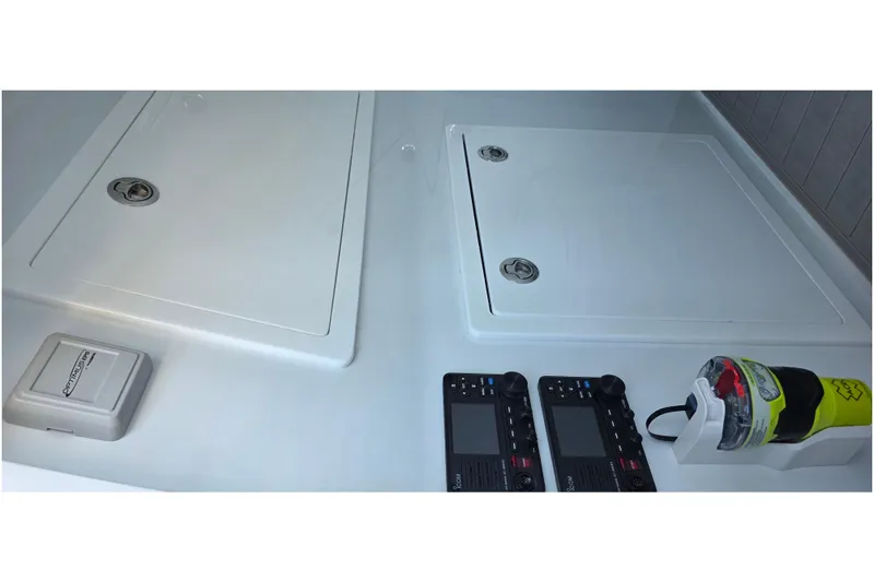 Wanderlust Yacht Photos Pics 2024 Costa Custom Boats 34 SV interior with control panels and storage compartments.