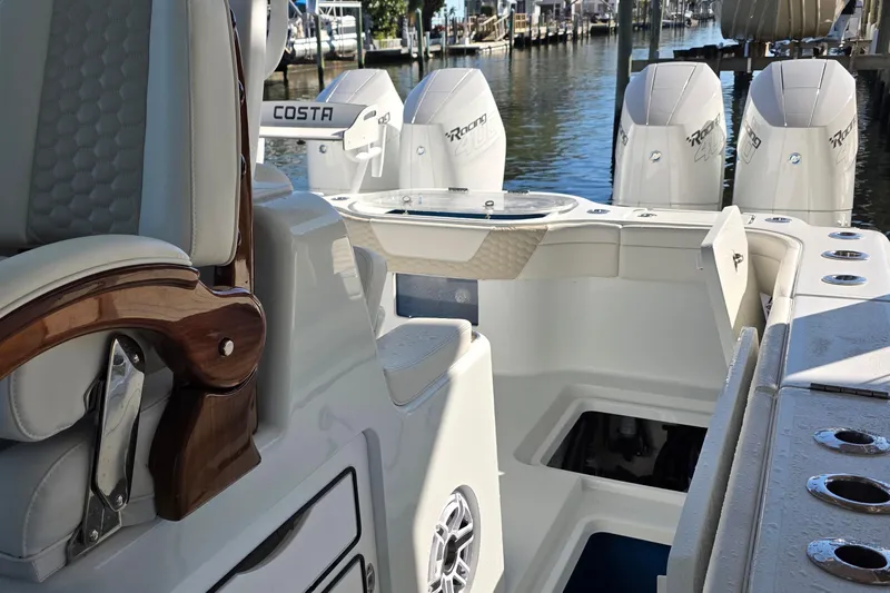 Wanderlust Yacht Photos Pics 2024 Costa Custom Boats 34 SV interior with luxurious seating and powerful engines.