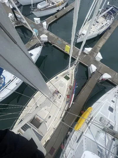  Yacht Photos Pics Aerial view of 1999 Island Packet 380 sailboat docked in a marina.