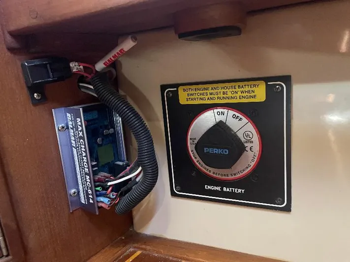  Yacht Photos Pics Battery switch panel on a 1999 Island Packet 380 sailboat, featuring Perko engine battery controls.