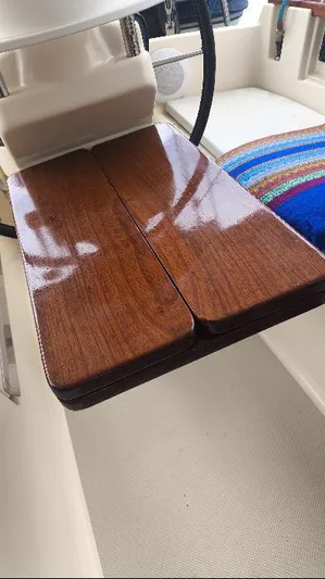  Yacht Photos Pics Polished wooden table on 1999 Island Packet 380 sailboat deck.