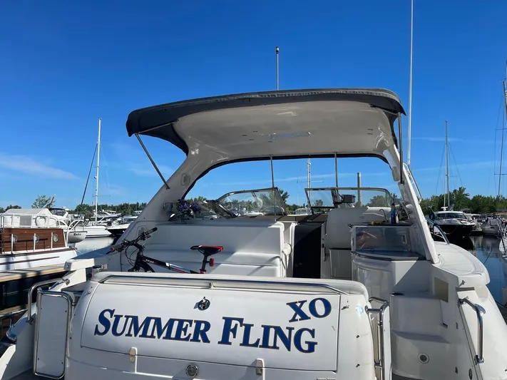  Yacht Photos Pics 2005 Regal Commodore 4260 yacht named "Summer Fling" docked at a marina.