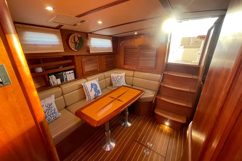 Ocean Breeze Yacht Photos Pics Luxurious interior of 2008 Sabre 38 Salon Express yacht with elegant wood finish.