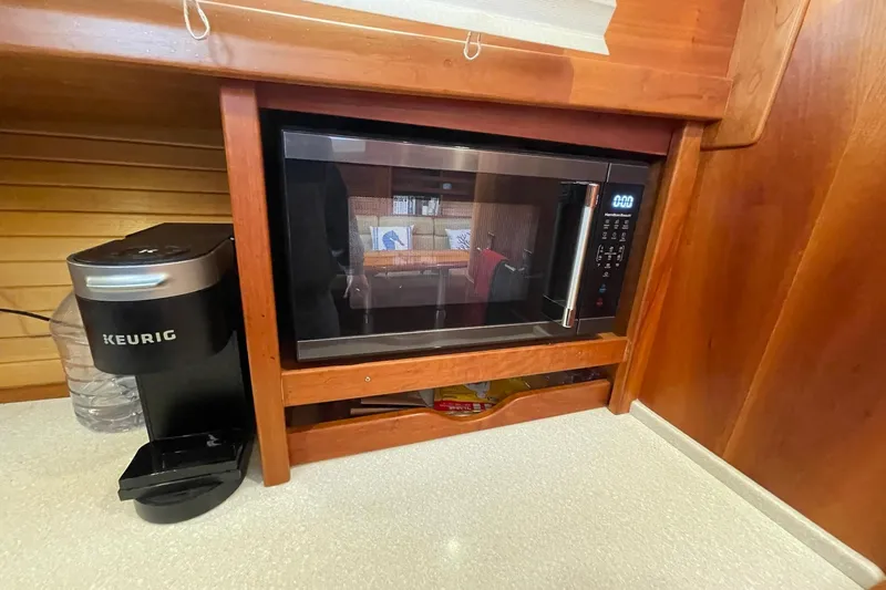 Ocean Breeze Yacht Photos Pics Microwave and Keurig coffee maker in 2008 Sabre 38 Salon Express kitchen.