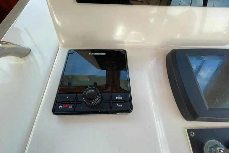 Ocean Breeze Yacht Photos Pics Raymarine control panel on 2008 Sabre 38 Salon Express yacht dashboard.