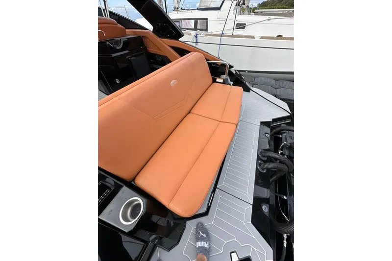  Yacht Photos Pics 2021 Cruisers Yachts 338 South Beach Edition Bow Rider with orange seating and sleek design.