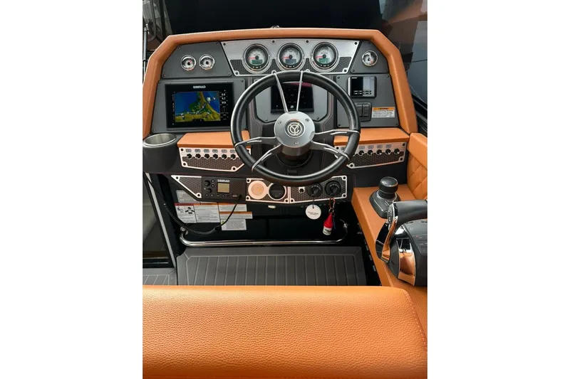  Yacht Photos Pics 2021 Cruisers Yachts 338 South Beach Edition Bow Rider helm with modern controls and navigation.