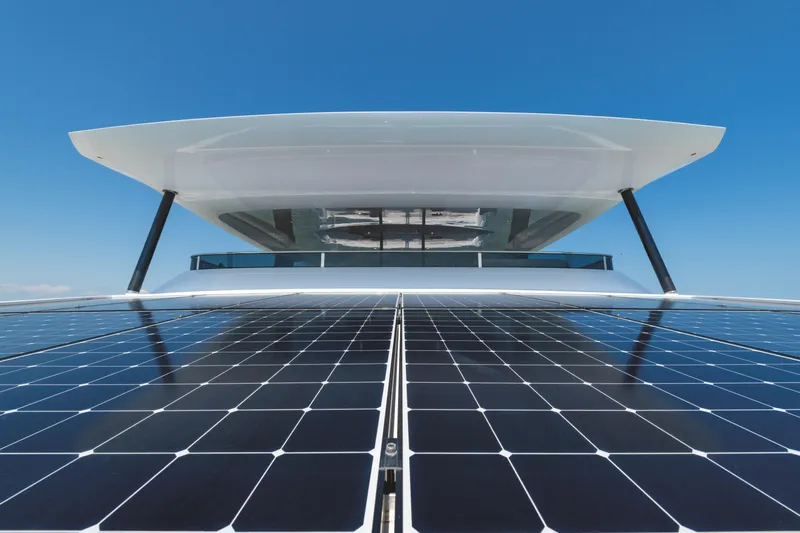  Yacht Photos Pics Silent 60 yacht with solar panels, 2025 model, under clear blue sky.