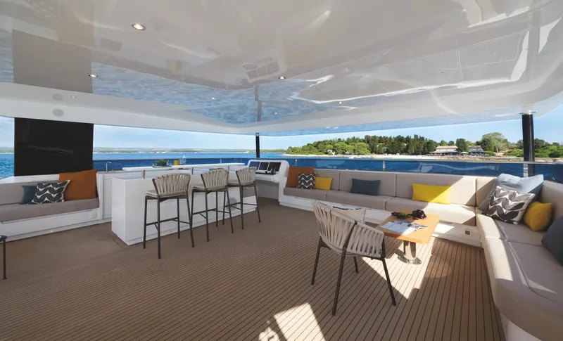  Yacht Photos Pics Luxurious 2025 Silent 60 yacht interior with spacious seating and ocean view.