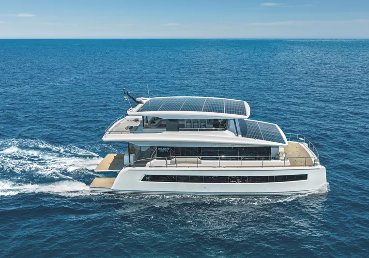  Yacht Photos Pics Silent 60 yacht cruising on open sea, 2025 model, featuring solar panels.