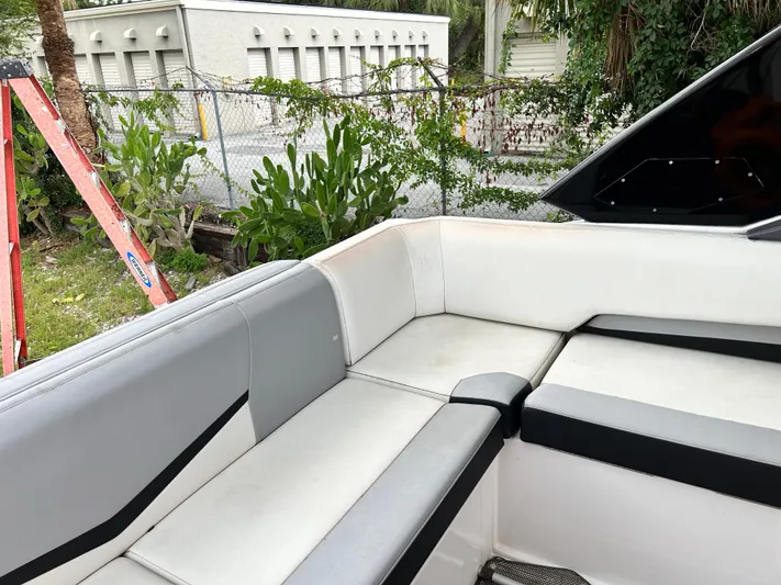 Swallow Yacht Photos Pics 2017 Cruisers Yachts 338 Sport Series interior seating, white and gray upholstery.