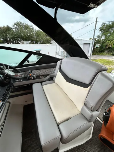 Swallow Yacht Photos Pics 2017 Cruisers Yachts 338 Sport Series interior with plush seating and modern dashboard.