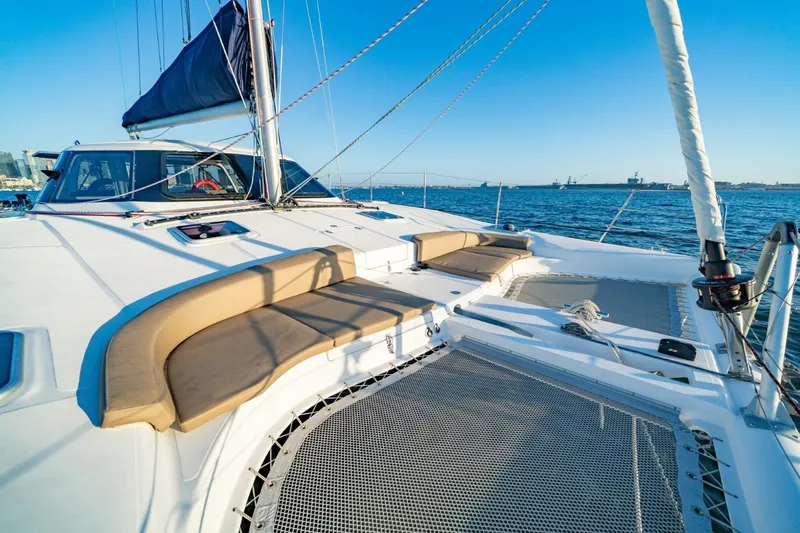 Sugarloaf Yacht Photos Pics 2023 Seawind 1160 Lite catamaran with spacious deck and seating, sailing on open water.