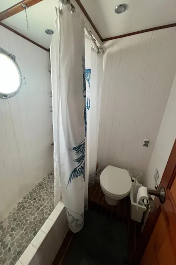 No Good Deed Yacht Photos Pics Bathroom interior of 2007 Great Harbour N47 yacht with shower and toilet.