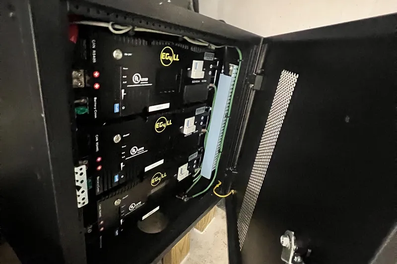 No Good Deed Yacht Photos Pics Electrical panel inside a Great Harbour N47 yacht, 2007 model, showcasing wiring and components.