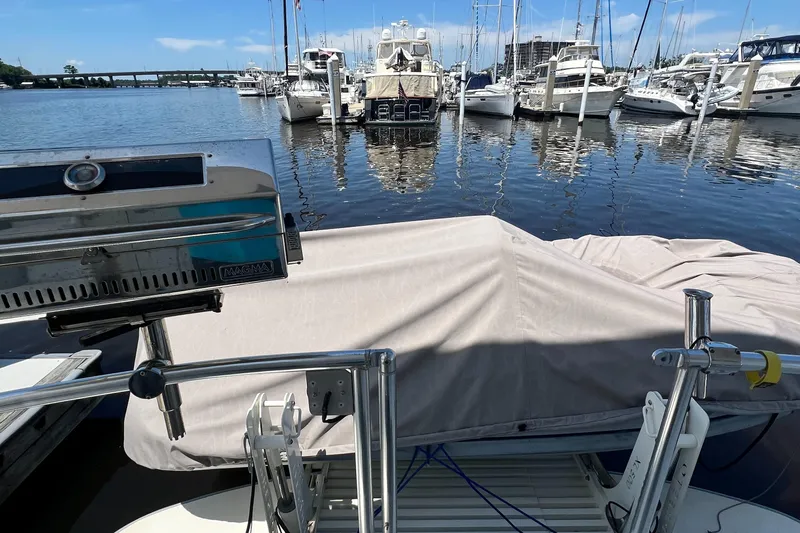 No Good Deed Yacht Photos Pics 2007 Great Harbour N47 yacht docked in a marina with other boats.