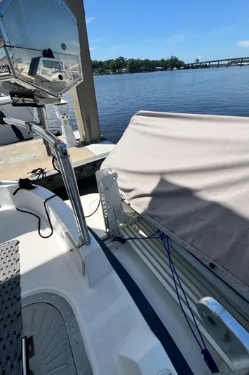 No Good Deed Yacht Photos Pics 2007 Great Harbour N47 boat docked by a serene waterfront.