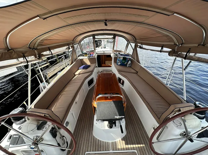  Yacht Photos Pics 2011 Jeanneau Sun Odyssey 45 DS sailboat cockpit with spacious seating and dual steering wheels.