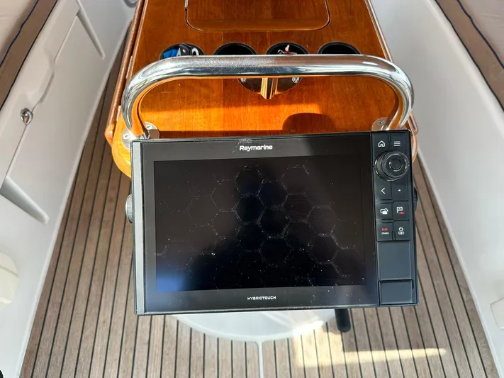 Yacht Photos Pics Raymarine navigation system on Jeanneau Sun Odyssey 45 DS, 2011 model, with wooden cockpit details.