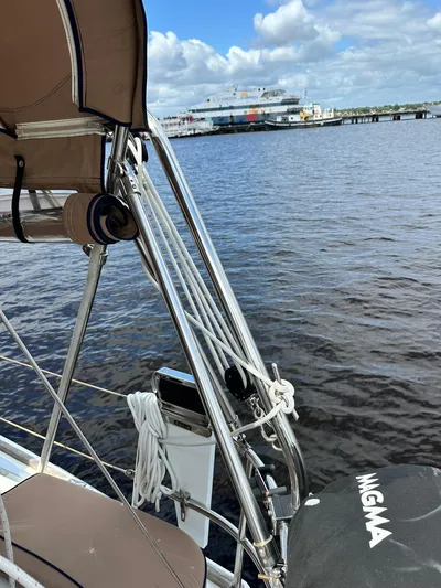  Yacht Photos Pics Jeanneau Sun Odyssey 45 DS sailboat docked near a harbor, 2011 model.