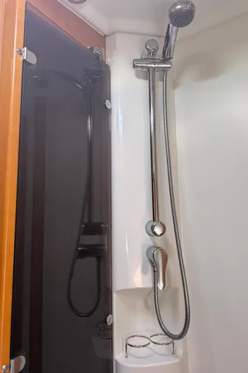 Yacht Photos Pics Shower area in 2011 Jeanneau Sun Odyssey 45 DS yacht, featuring modern fixtures.