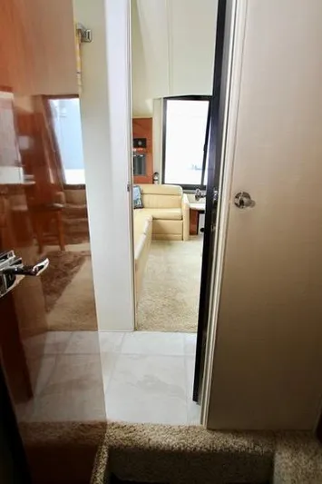 Smitten Yacht Photos Pics Interior view of 2006 Harbor Master Coastal 400 yacht, featuring a cozy living area.