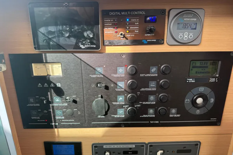 Willow Yacht Photos Pics Control panel of a 2008 Lagoon 420 yacht with various gauges and switches.