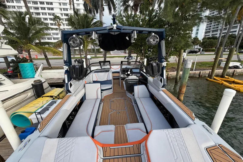 Coastal Edition Yacht Photos Pics 2022 Nautique Super Air Nautique G25 boat interior with luxurious seating and modern design.