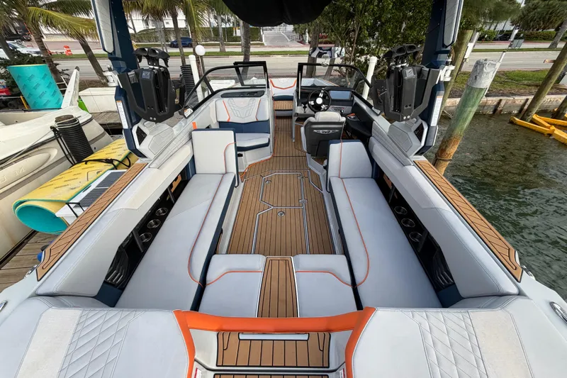 Coastal Edition Yacht Photos Pics 2022 Nautique Super Air Nautique G25 boat interior with spacious seating and modern design.