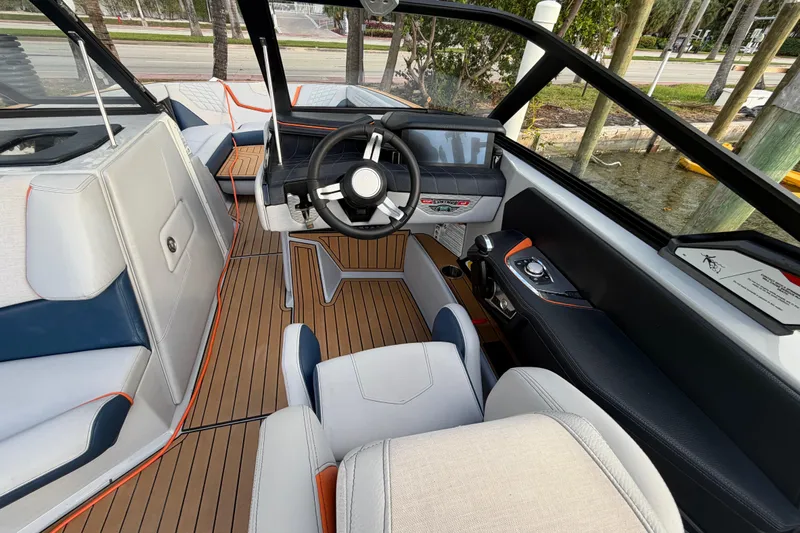 Coastal Edition Yacht Photos Pics 2022 Nautique Super Air Nautique G25 interior with sleek design and modern controls.
