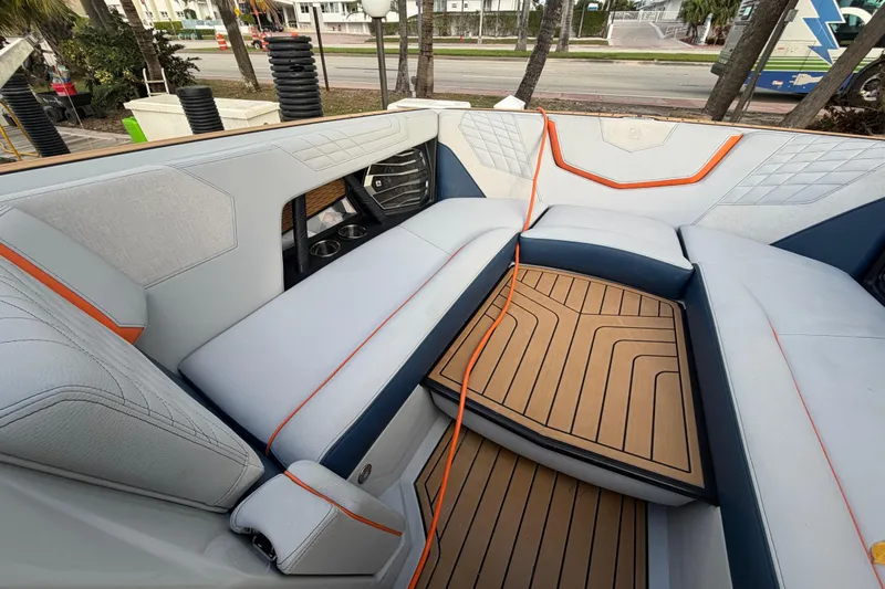 Coastal Edition Yacht Photos Pics 2022 Nautique Super Air Nautique G25 interior with stylish seating and modern design.