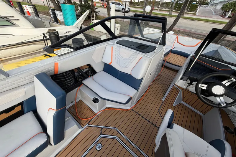 Coastal Edition Yacht Photos Pics 2022 Nautique Super Air Nautique G25 interior with luxurious seating and modern design.