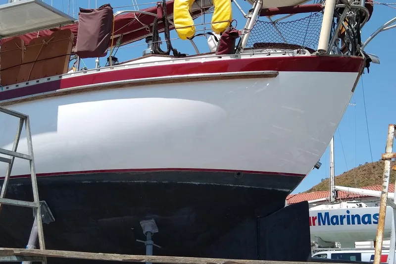 Talaria Yacht Photos Pics 1988 Tayana Vancouver 42 sailboat on dry dock, showcasing hull and deck details.