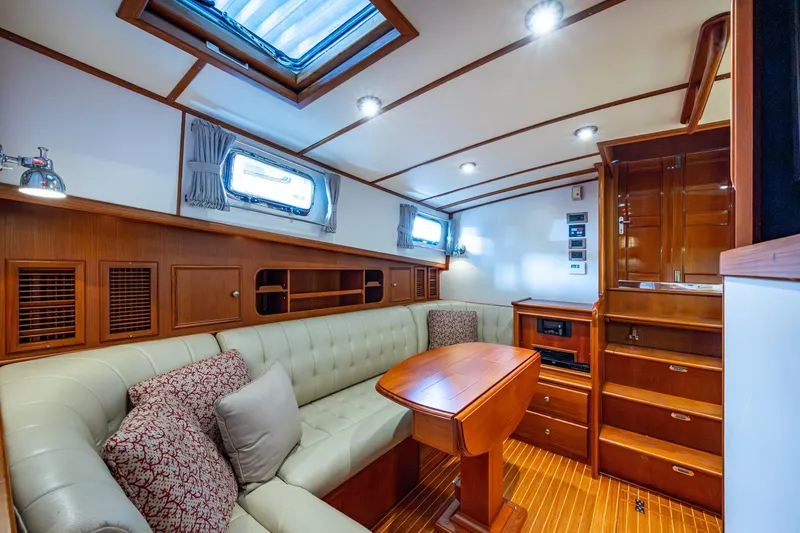 Bright Star Yacht Photos Pics Luxurious 2003 Grand Banks 49 Eastbay HX yacht interior with elegant wood finish and plush seating.