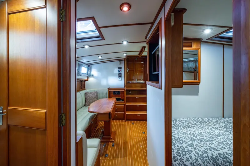 Bright Star Yacht Photos Pics Luxurious 2003 Grand Banks 49 Eastbay HX yacht interior with wood finish and elegant furnishings.