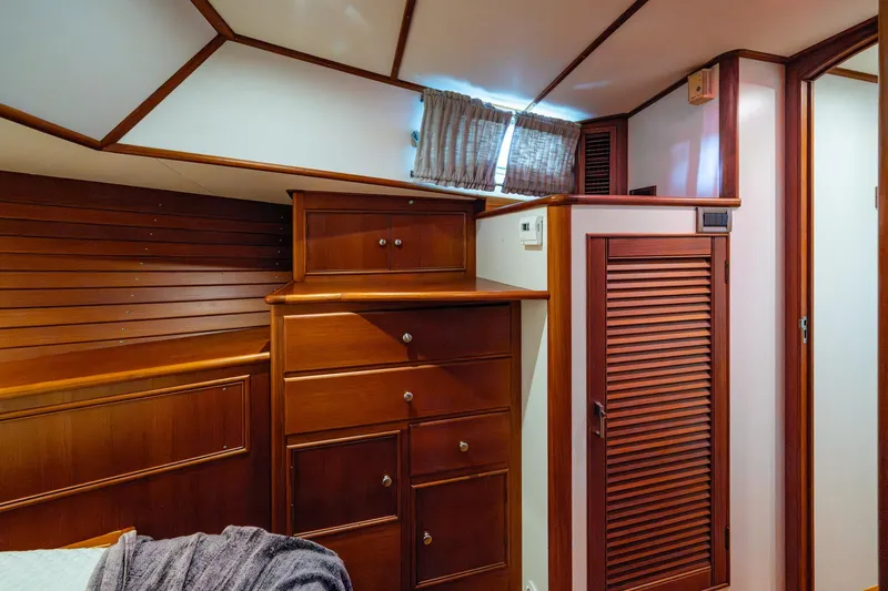Bright Star Yacht Photos Pics Luxurious wooden interior of 2003 Grand Banks 49 Eastbay HX yacht cabin.