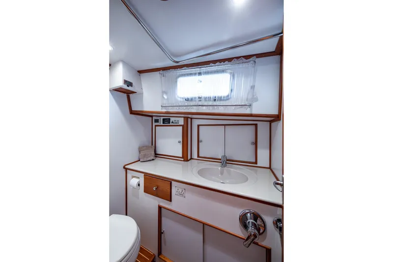 Bright Star Yacht Photos Pics Luxurious bathroom interior of 2003 Grand Banks 49 Eastbay HX yacht.