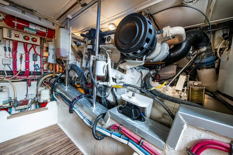 Bright Star Yacht Photos Pics Engine room of 2003 Grand Banks 49 Eastbay HX with complex machinery and wiring.