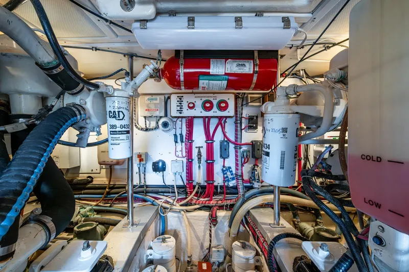 Bright Star Yacht Photos Pics Engine room of 2003 Grand Banks 49 Eastbay HX with mechanical components and wiring.
