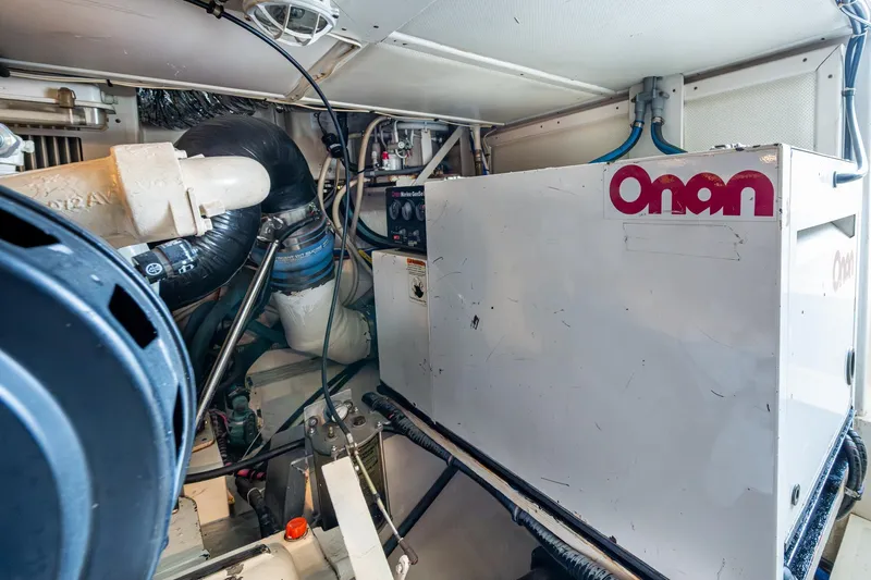 Bright Star Yacht Photos Pics Engine room of 2003 Grand Banks 49 Eastbay HX with Onan generator.