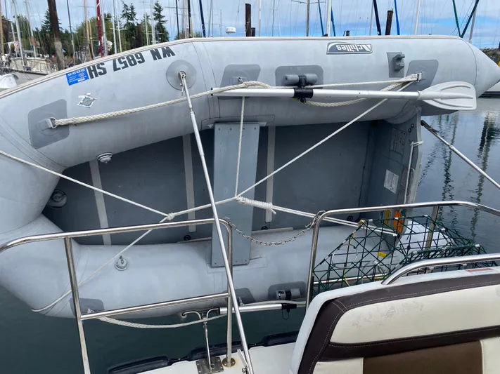 Sal-taire Yacht Photos Pics Inflatable dinghy secured on a 2016 Ranger Tugs R-29S boat at a marina.