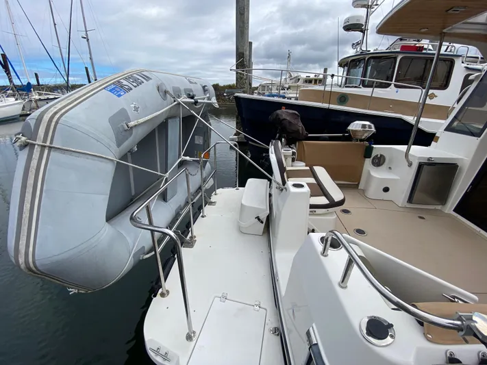 Sal-taire Yacht Photos Pics 2016 Ranger Tugs R-29S with inflatable dinghy docked at marina.