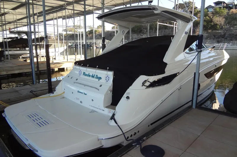 Rancho Del Lago Yacht Photos Pics 2017 Sea Ray Sundancer 350 docked in a marina, covered and ready for use.